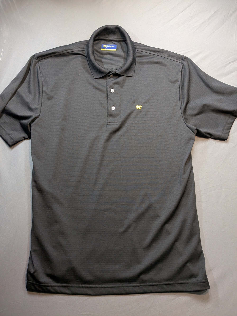Men's Black Polo with Small Gold Emblem